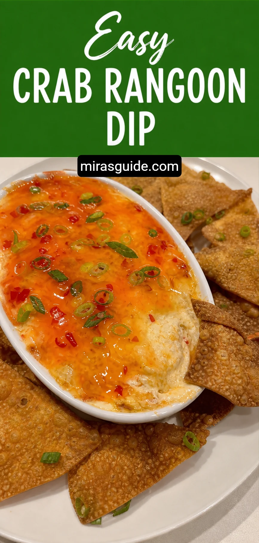 Crab rangoon dip in a baking dish surrounded by fried wonton chips